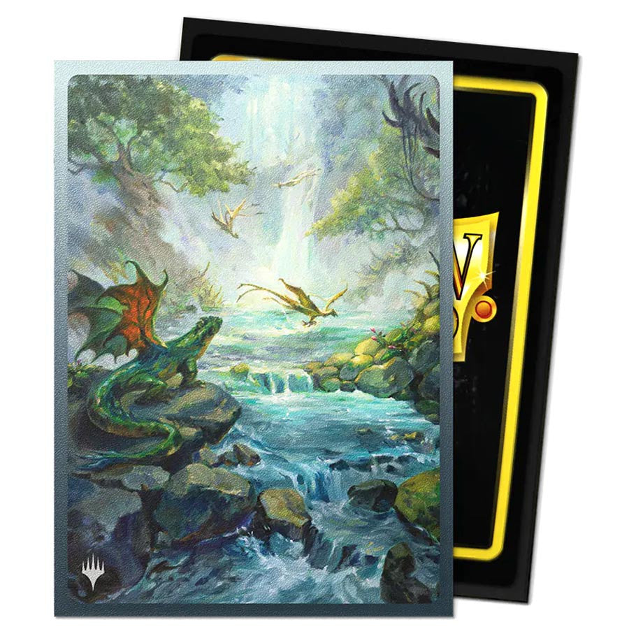 Dragon Shield: Art: Dual Matte: Magic the Gathering: Landfall Series: Misty Rainforest sleeves featuring a green dragon by a waterfall, packaged in a black and yellow box.