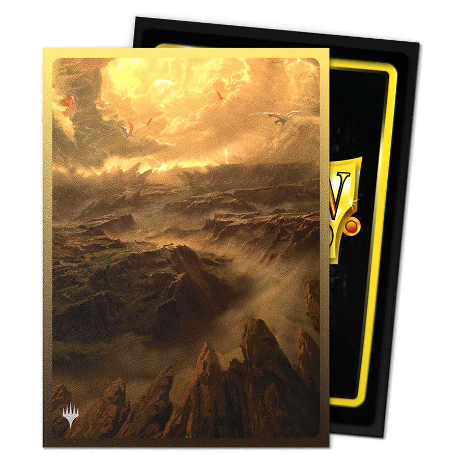 Dragon Shield: Art: Dual Matte sleeves featuring Arid Mesa's golden canyon with dragons, packaged in a black-and-yellow box, perfect for MTG enthusiasts.