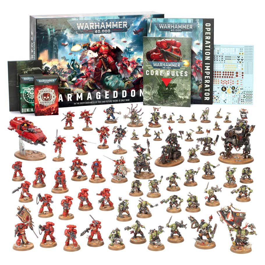 Warhammer 40,000 Armageddon game set with miniatures and rulebooks on a white background