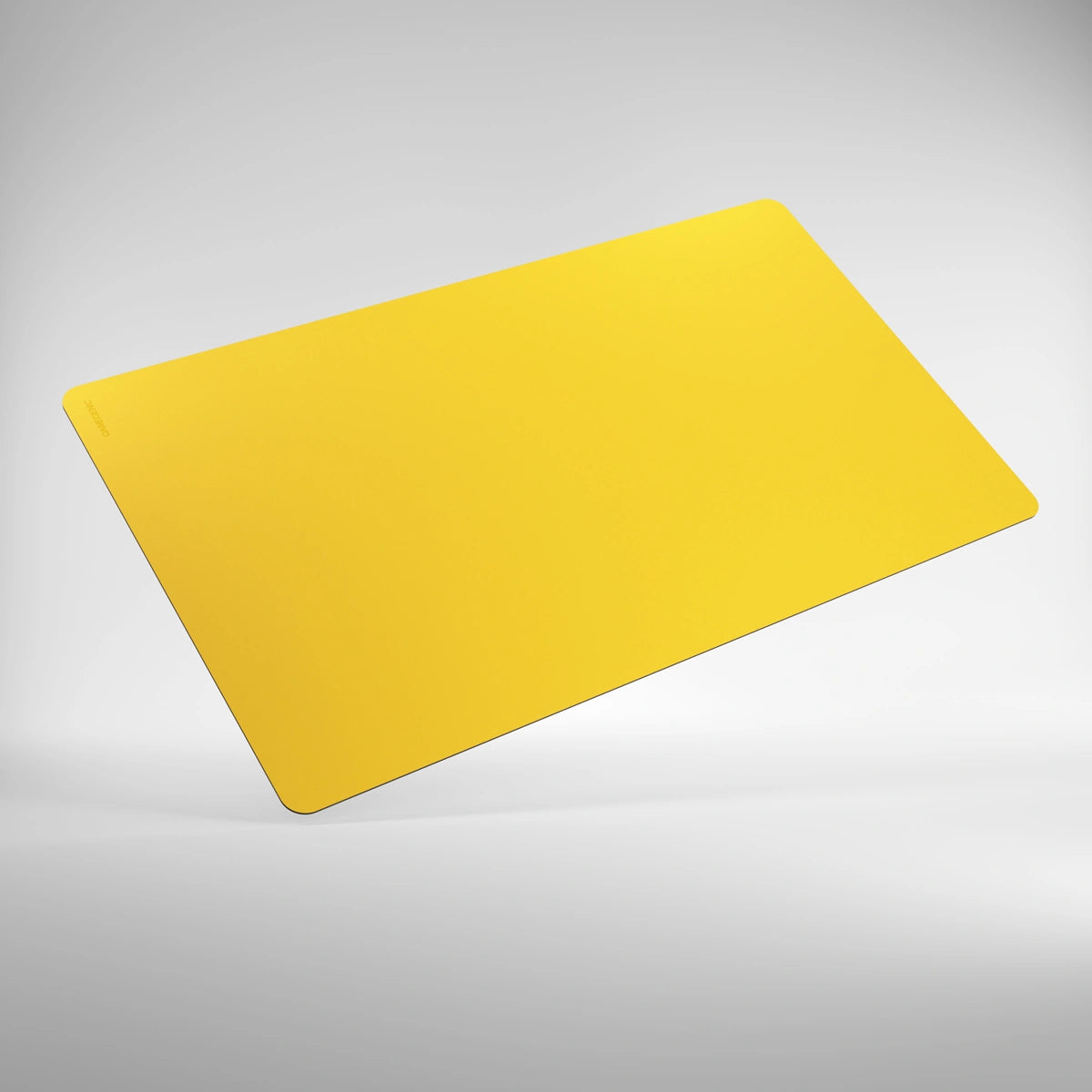 GameGenic: Playmat: Prime: Yellow—bright-yellow, softly cushioned mat, ideal for card games, with anti-slip backing and subtle logo, perfect for MTG enthusiasts.