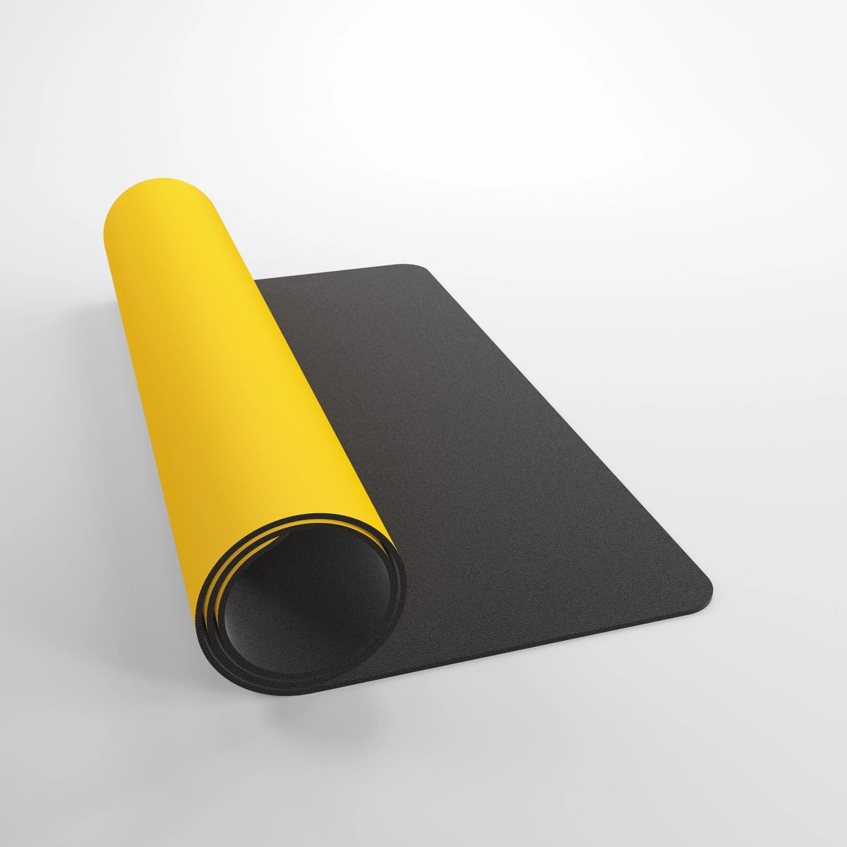 GameGenic: Playmat: Prime: Yellow, partially unrolled, showcasing its cushioned surface, anti-slip back, and subtle logo; ideal for card games and dice rolling.