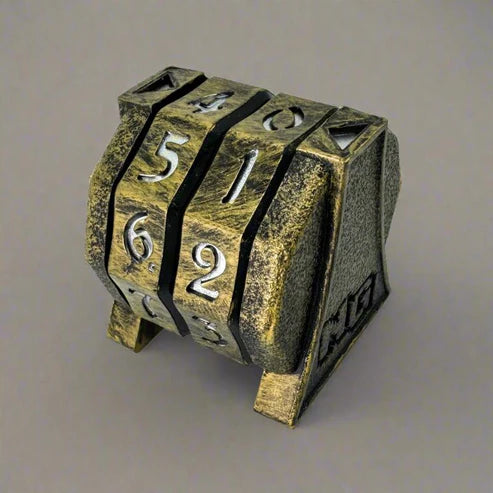 Steampunk-style puzzle box from Nerd Gear's Commander Essentials Kit, featuring three rotating number-wheels for secure game accessory storage.