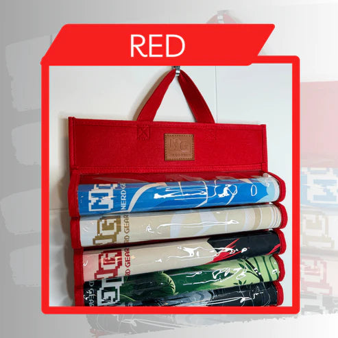 Nerd Gear Playmat Sanctuary: Red carrying case with handle holding four rolled playmats, wrapped in clear plastic, showcasing durable storage for game accessories.